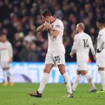 Jonny Evans of Manchester United looks dejected after Jean-Philippe Mateta of Crystal Palace scored his team