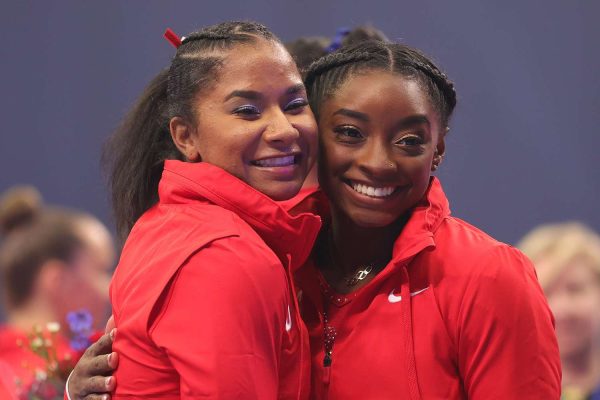 ordan Chiles and Simone Biles pose following the Women