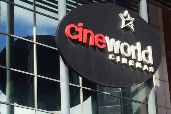 FILE PHOTO: A Cineworld cinema logo is pictured in Canary Wharf in London, Britain, March 11, 2020. REUTERS/Keith Weir/File Photo