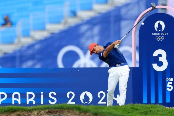 Pro golfer Xander Schauffele hits a tee shot on Saturday at the 2024 Olympic Games